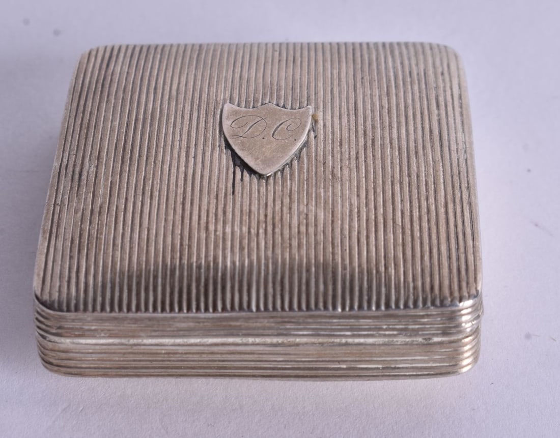 A Continental Silver Pill Box with Engraved Decoration. Dutch Marks. 1.7cm x 4.5cm x 4.5cm, weight (1 of 4)
