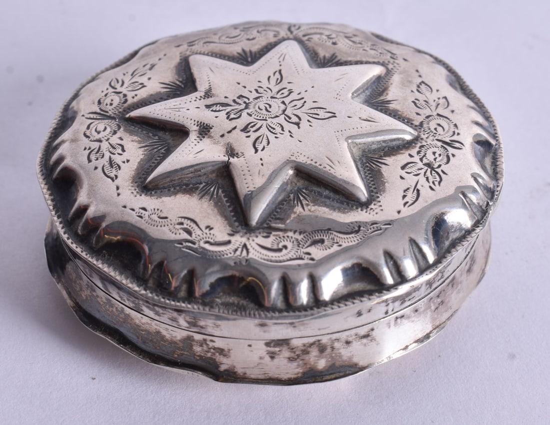 A Continental Silver Pill Box with Engraved Decoration. Stamped 800. 2.2cm x 5.7cm, weight 27g (1 of 4)
