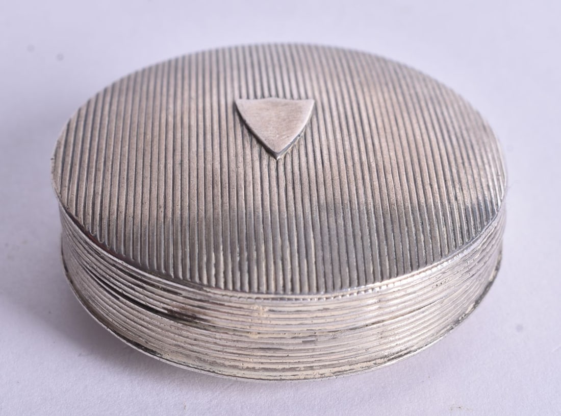 A Continental Silver Pill Box with Engraved Decoration. Dutch Marks 1832. 1.9cm x 4.9cm, weight 23 (1 of 5)