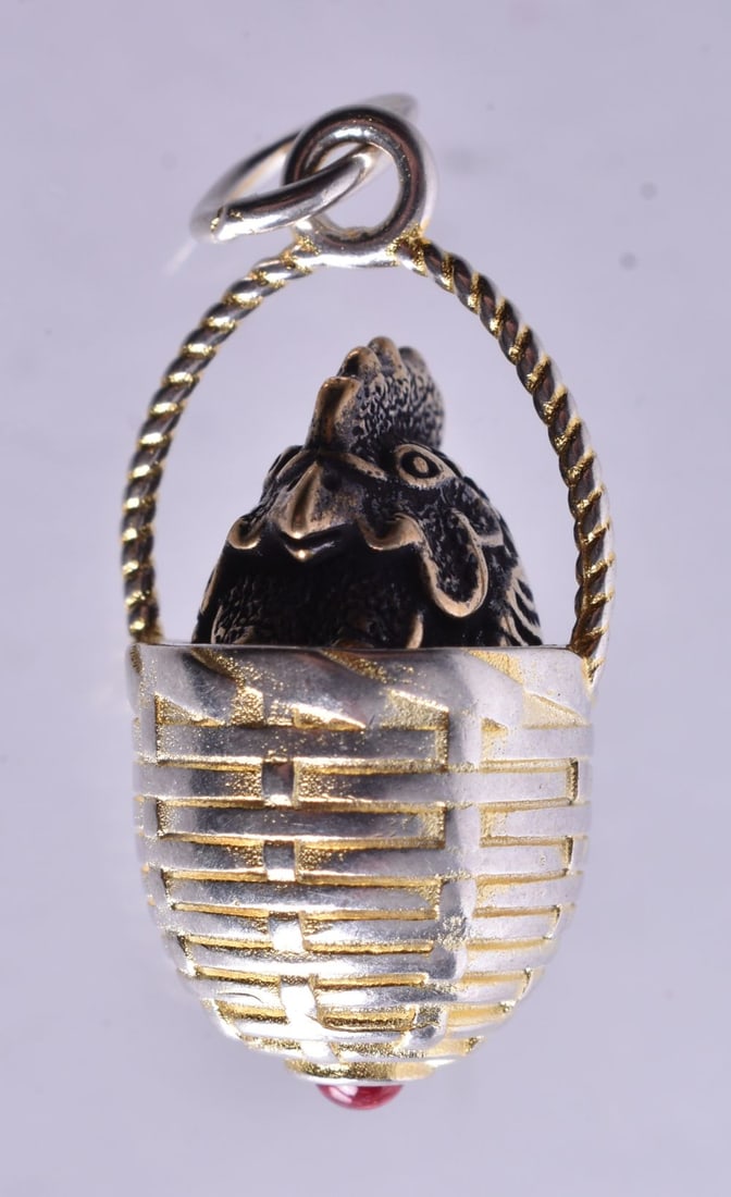 A Silver Chick in a Basket Pendant. Bail Stamped 84. 3.9cm x 1.5cm x 1.4cm, weight 9g: A Silver Chick in a Basket Pendant. Bail Stamped 84. 3.9cm x 1.5cm x 1.4cm, weight 9g