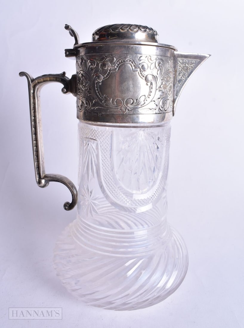 A Silver Mounted Claret Jug. Hallmarked Birmingham 1904. 23.5cm x 15cm x 12cm, weight 1170g (1 of 4)