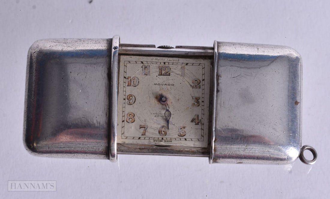 A Continental Silver Cased Movado Purse Watch. Not working, Stamped 935, 4.7cm x 3.3cm x 1.3cm, wei: A Continental Silver Cased Movado Purse Watch. Not working, Stamped 935, 4.7cm x 3.3cm x 1.3cm, weight 64g