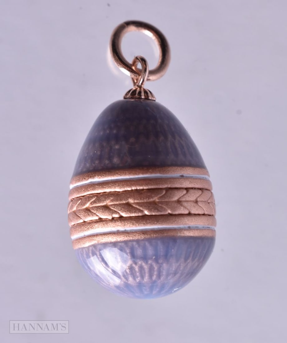 A Continental Silver Gilt and Lilac Enamel Pendant. Stamped 88 on the Bail, 2.4cm x 1.3cm, weight 2 (1 of 3)
