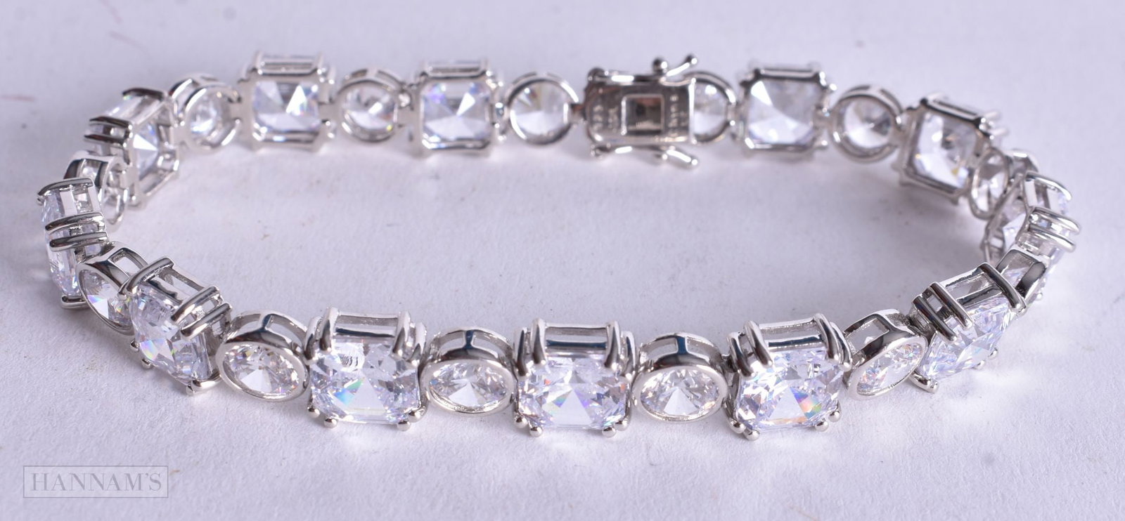 A Silver and CZ Bracelet. Stamped 925, 20cm long, weight 28.6g (1 of 3)