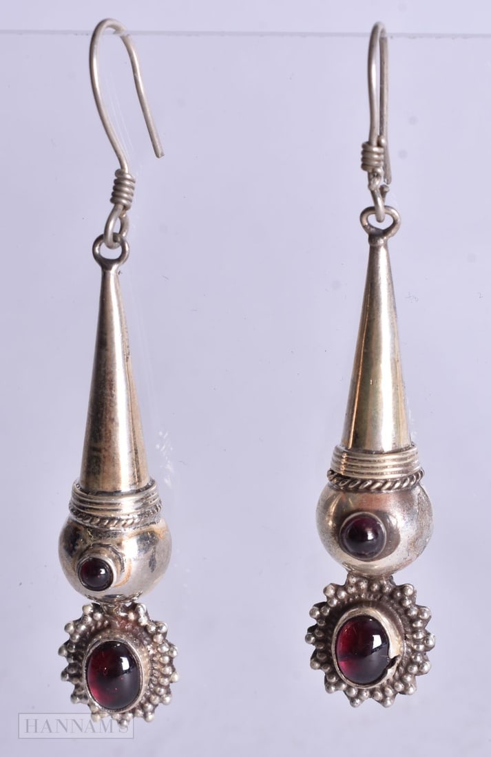 A Pair of Silver and Garnet Earrings. Stamped 925, 7.1cm x 1.2cm, weight 11.2g (1 of 2)