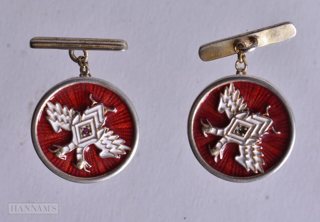 A Pair of Continental Silver Gilt and Enamel Dog Head Cufflinks. Stamped 84. 1.9cm x 2.4cm, weight (1 of 2)