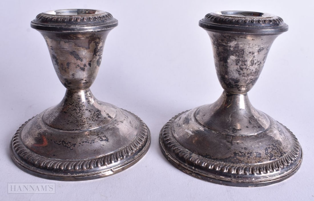 A Pair of Weighted Silver Squat Candlesticks. Stamped Sterling. 7.8cm high, total weight 535g (2) (1 of 3)