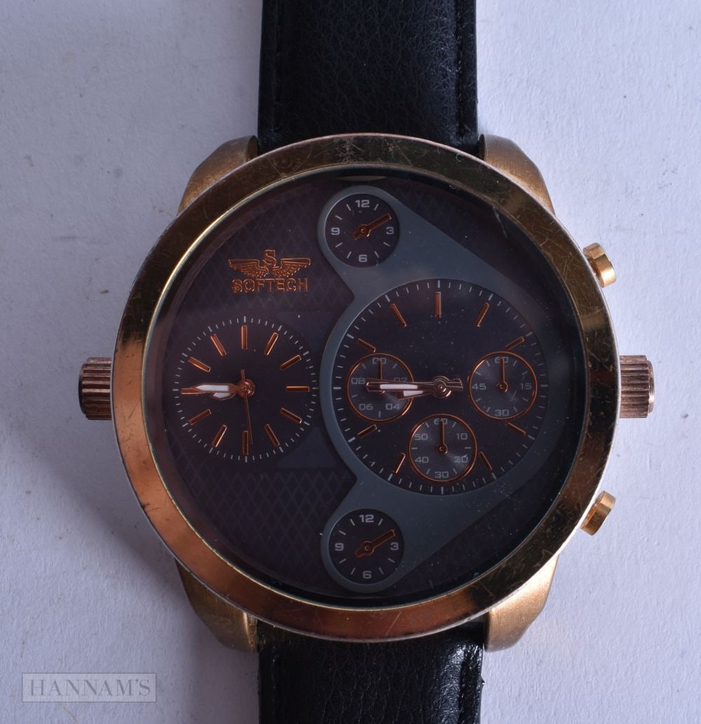 A Softech J687 Watch with Black Face and Gold Numerals. 6.2cm incl crowns, Working: A Softech J687 Watch with Black Face and Gold Numerals. 6.2cm incl crowns, Working
