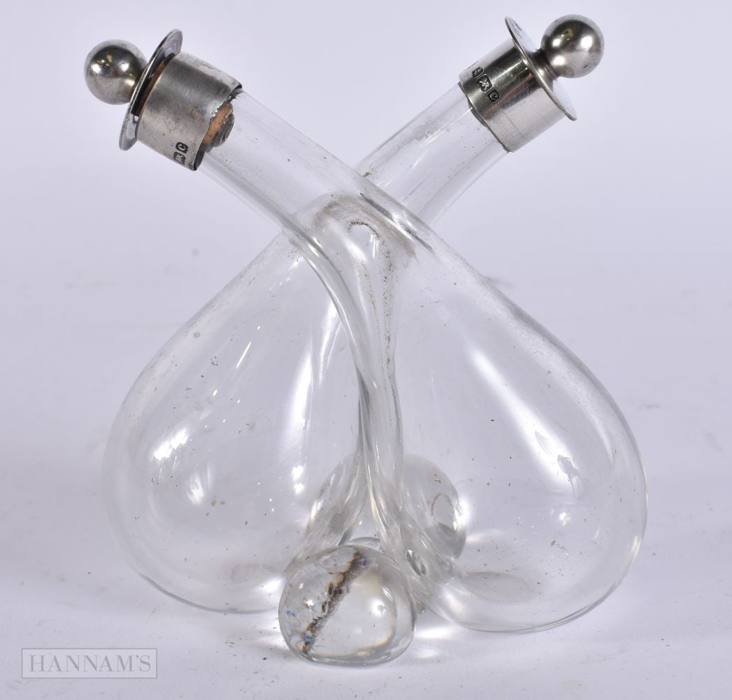 A SILVER MOUNTED GLASS OIL AND VINEGAR BOTTLE. 11 cm x 7 cm. (1 of 5)