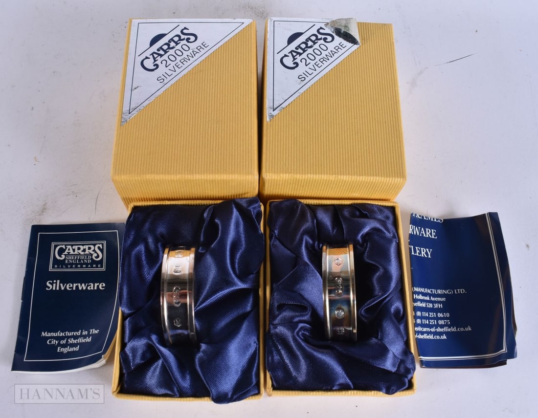 A PAIR OF BOXED CARRS SILVER NAPKIN RINGS. 27 grams. Sheffield 2000. Ring 4 cm wide. (1 of 4)