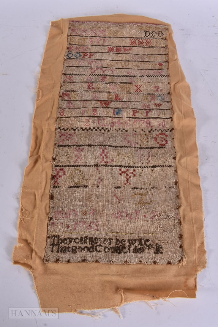 AN 18TH CENTURY SAMPLER. 48 cm x 28 cm. (1 of 6)