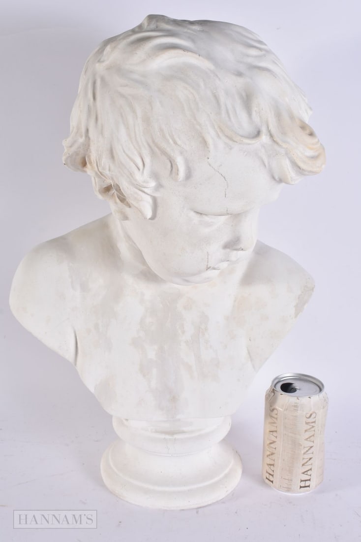 A LARGE PLASTER BUST OF A BOY. 46 cm x 24 cm. (1 of 5)