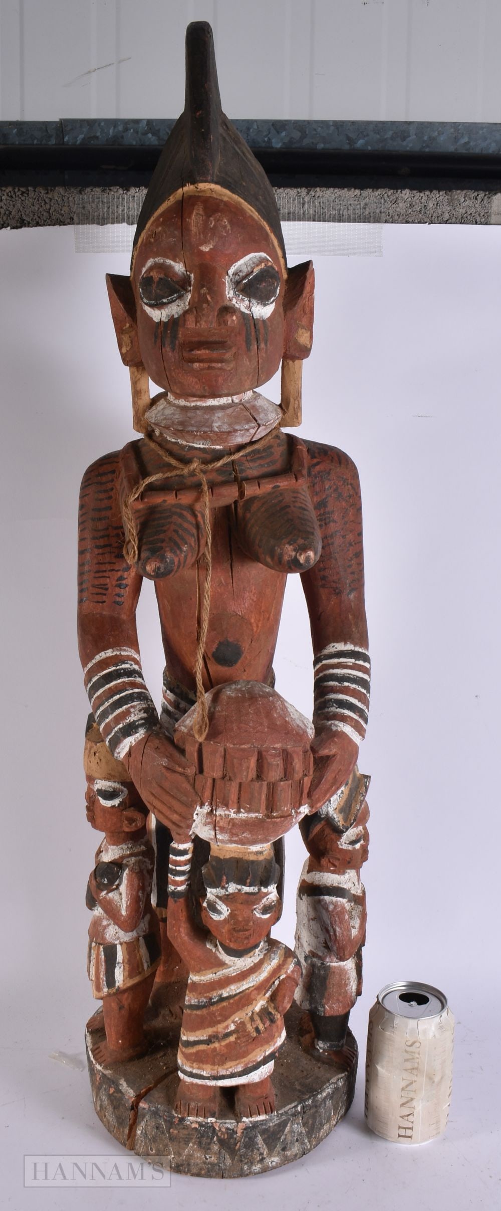 A LARGE AFRICAN YORUBA PAINTED WOOD TRIBAL FIGURE. 86 cm high. (1 of 7)
