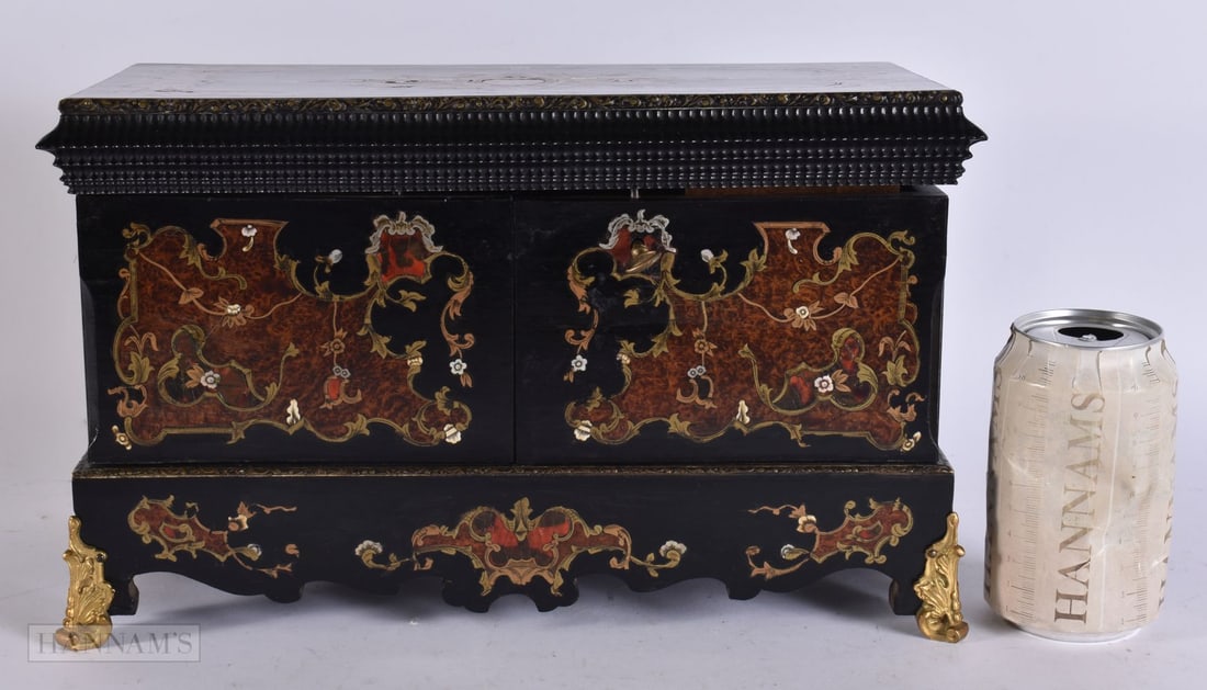 AN EARLY VICTORIAN BURR WALNUT BRASS INLAID BOULLE TEA CADDY decorated with foliage and vines. 33 cm (1 of 6)