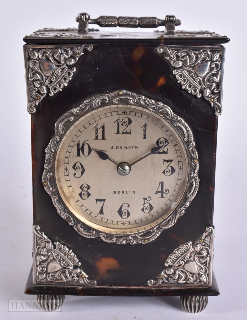 A VICTORIAN SILVER MOUNTED TORTOISESHELL CARRIAGE CLOCK. 14 cm high inc handle. (1 of 7)