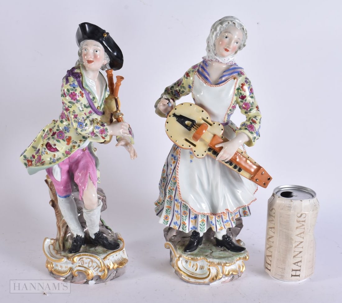 A LARGE PAIR OF 19TH CENTURY MEISSEN PORCELAIN FIGURES both modelled playing instruments. 33 cm high (1 of 7)