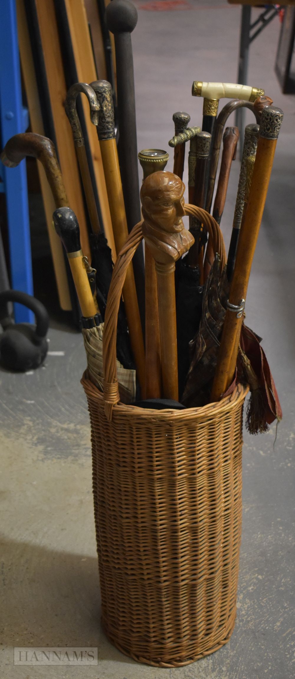 A GOOD COLLECTION OF ANTIQUE WALKING CANES AND PARASOLS including several silver mounted, a Victoria (1 of 8)