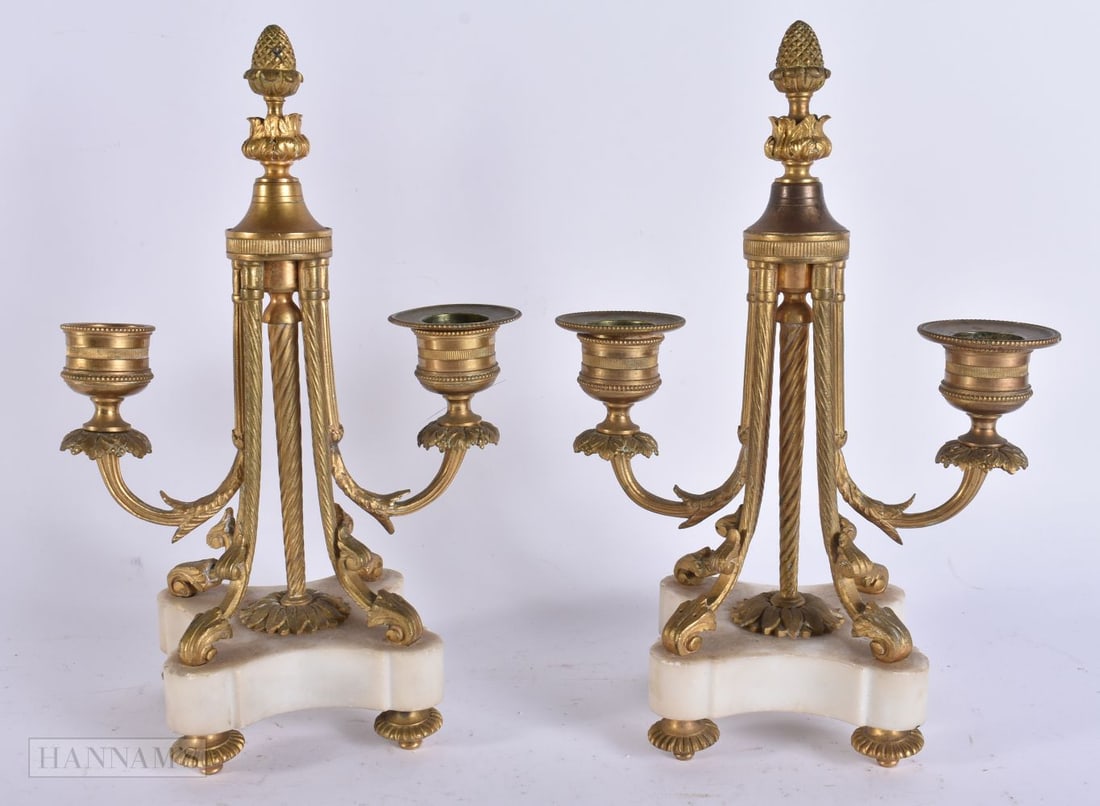 A PAIR OF ANTIQUE BRONZE AND MARBLE CANDLESTICKS. 24 cm high. (1 of 4)