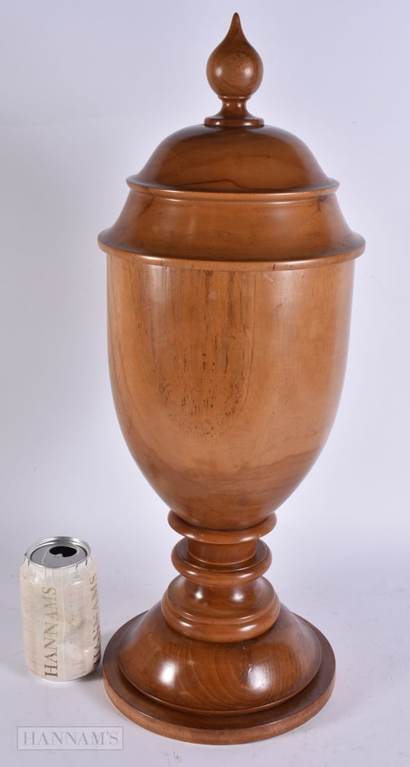 A LARGE COUNTRY HOUSE CARVED FRUITWOOD URN AND COVER. 53 cm high.: A LARGE COUNTRY HOUSE CARVED FRUITWOOD URN AND COVER. 53 cm high.