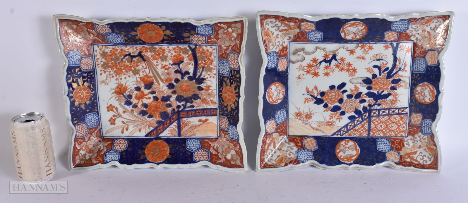 A LARGE PAIR OF 19TH CENTURY JAPANESE MEIJI PERIOD IMARI RECTANGULAR DISHES painted with flowers. 33: A LARGE PAIR OF 19TH CENTURY JAPANESE MEIJI PERIOD IMARI RECTANGULAR DISHES painted with flowers. 33 cm x 26 cm.