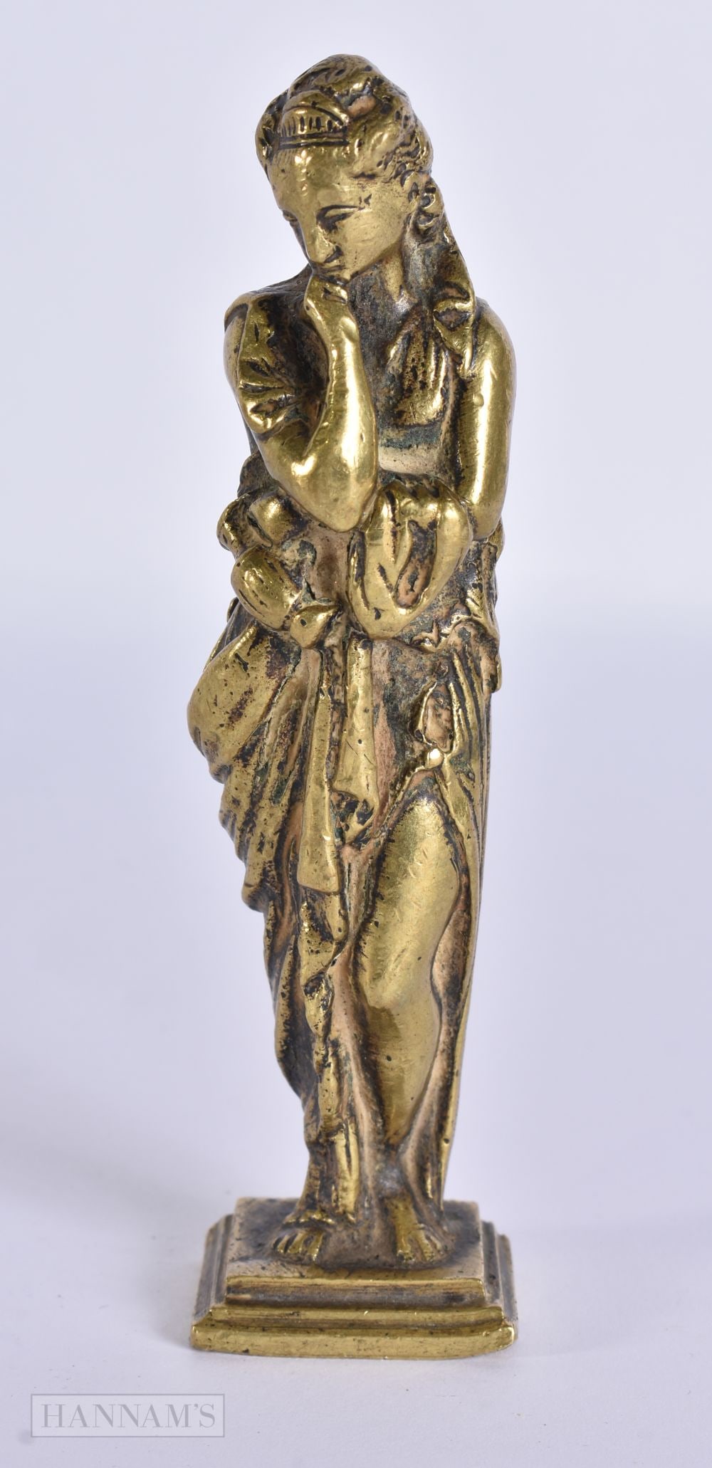 AN 18TH/19TH CENTURY BRONZE FIGURE OF A CLASSICAL FEMALE modelled in flowing robes. 12.5 cm high.: AN 18TH/19TH CENTURY BRONZE FIGURE OF A CLASSICAL FEMALE modelled in flowing robes. 12.5 cm high.