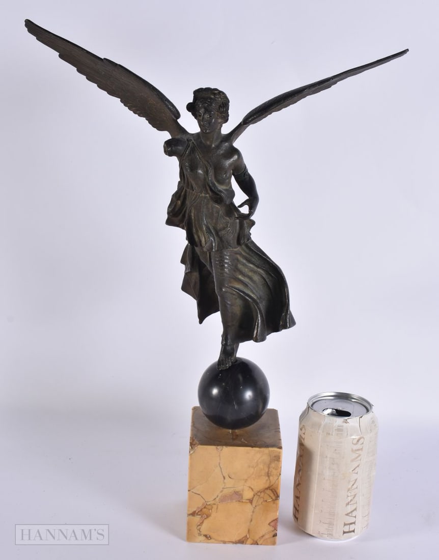 AN 18TH/19TH CENTURY GRAND TOUR BRONZE FIGURE OF NIKE (WINGED VICTORY) modelled upon a sienna marble: AN 18TH/19TH CENTURY GRAND TOUR BRONZE FIGURE OF NIKE (WINGED VICTORY) modelled upon a sienna marble base. 43 cm x 25cm. 43 cm x 25cm.