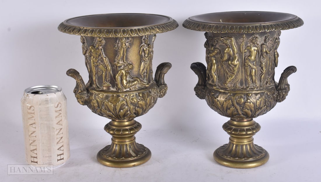 A LOVELY PAIR OF 18TH/19TH CENTURY GRAND TOUR BRONZE CAMPAGNA URNS decorated in relief with classica: A LOVELY PAIR OF 18TH/19TH CENTURY GRAND TOUR BRONZE CAMPAGNA URNS decorated in relief with classical figures. 22cm x 16 cm.