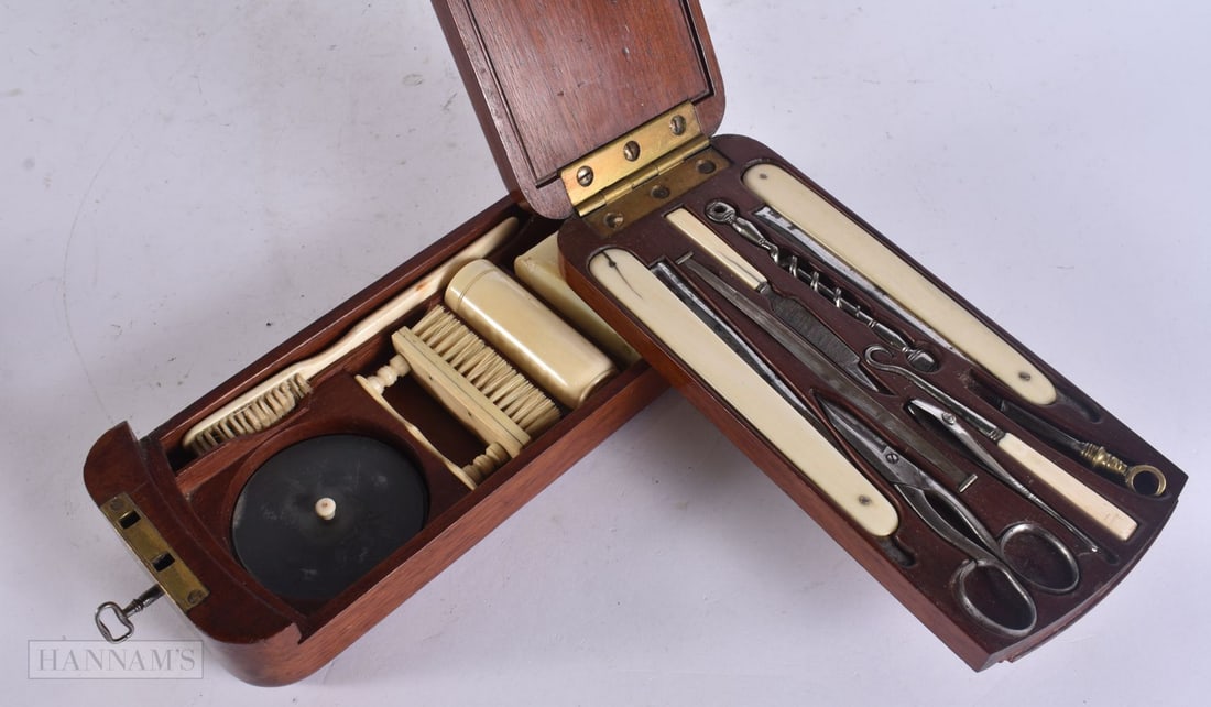 A FINE AND RARE EARLY 19TH CENTURY GENTLEMAN'S TRAVELLING BOX with sliding compartments, inscribed T (1 of 9)