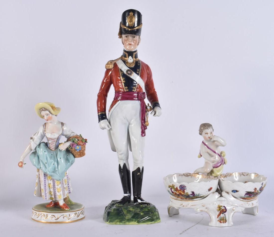 A 19TH CENTURY BERLIN PORCELAIN SWEETMEAT DISH together with two Dresden figures. Largest 27cm high. (1 of 4)