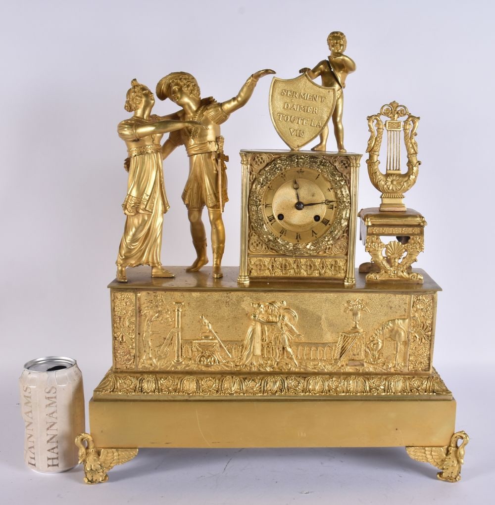 A 19TH CENTURY FRENCH GILT BRONZE MANTEL CLOCK formed with classical figures. 44 cm x 32 cm. (1 of 8)