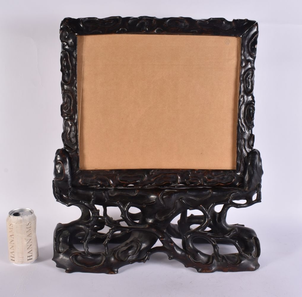 A VERY RARE 19TH CENTURY CHINESE CARVED HARDWOOD SCREEN ON STAND probably Zitan. 53 cm x 38 cm.: A VERY RARE 19TH CENTURY CHINESE CARVED HARDWOOD SCREEN ON STAND probably Zitan. 53 cm x 38 cm.