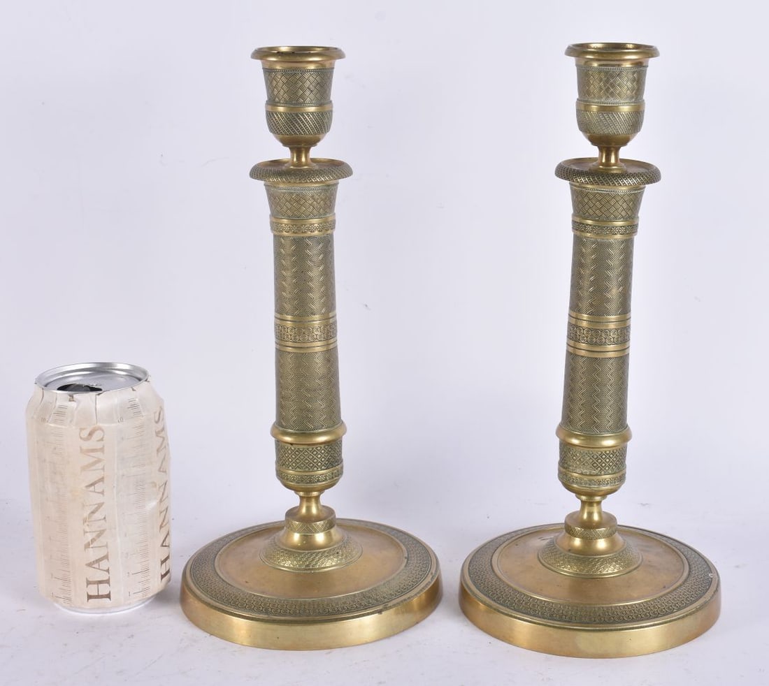 A PAIR OF 19TH CENTURY FRENCH BRONZE CANDLESTICKS. 28cm high. (1 of 5)