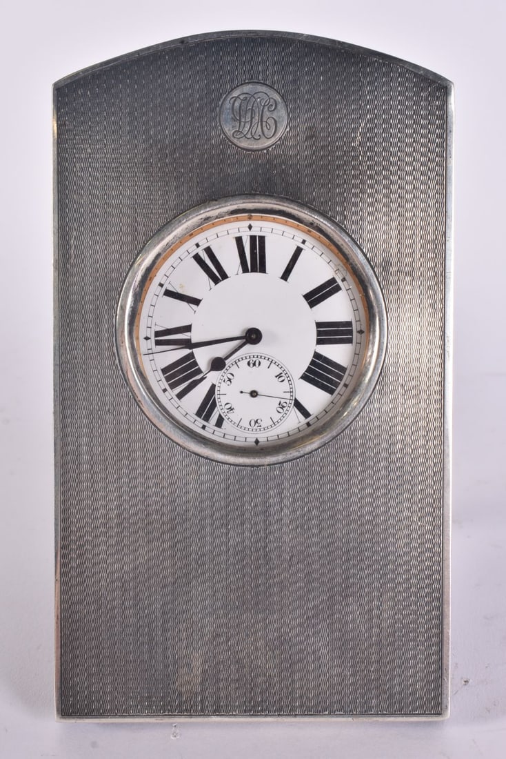 AN ANTIQUE SILVER CLOCK. 438 grams overall. 15 cm x 9 cm. (1 of 4)