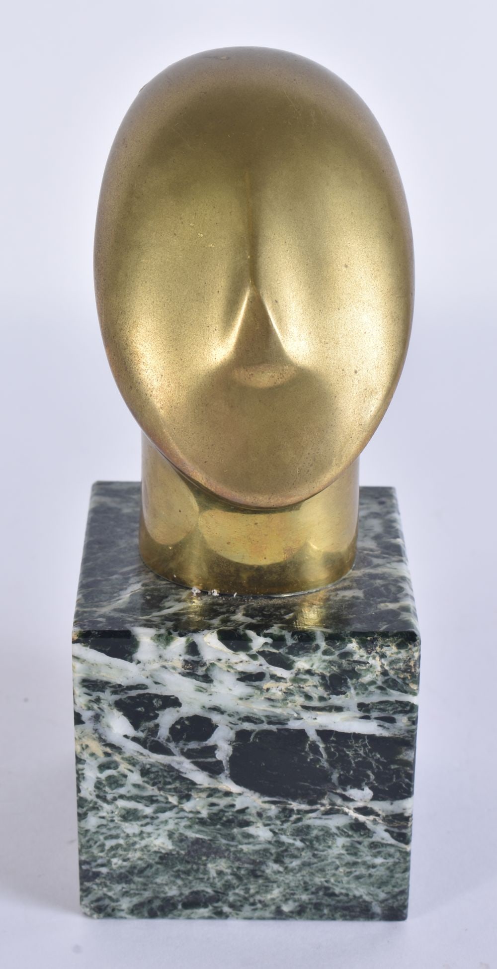 A FRENCH BRONZE AND MARBLE STYLISED IDOL BUST upon a marble plinth. 16 cm high.: A FRENCH BRONZE AND MARBLE STYLISED IDOL BUST upon a marble plinth. 16 cm high.