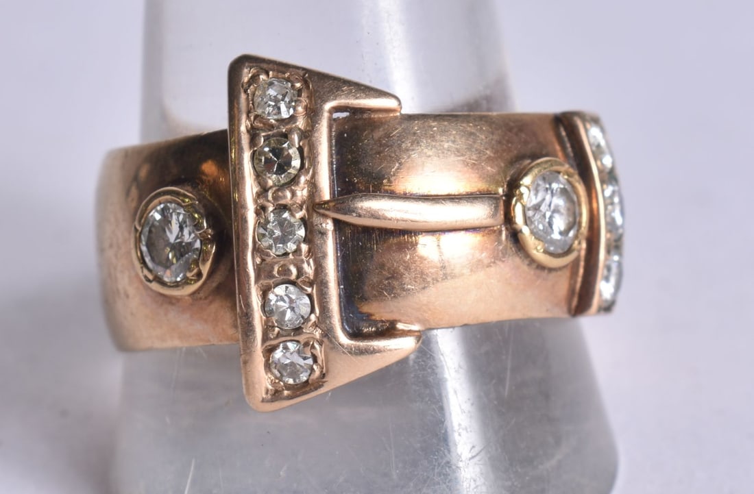 A 9CT GOLD AND DIAMOND RING. 8.8 grams. Y. (1 of 4)