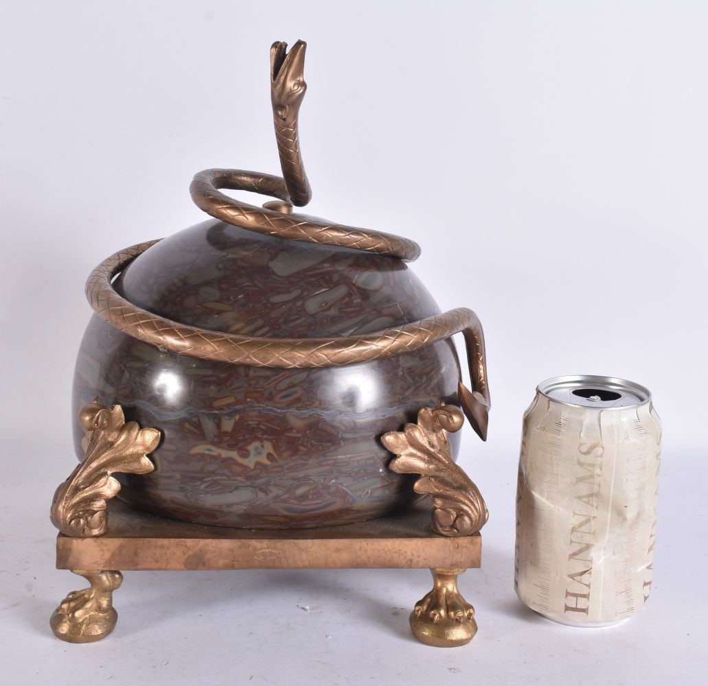 A RARE 19TH CENTURY GRAND TOUR GILT BRONZE AND BLOOD/PUDDING STONE CENTREPIECE mounted with a coiled: A RARE 19TH CENTURY GRAND TOUR GILT BRONZE AND BLOOD/PUDDING STONE CENTREPIECE mounted with a coiled serpent. 28cm x 18 cm.