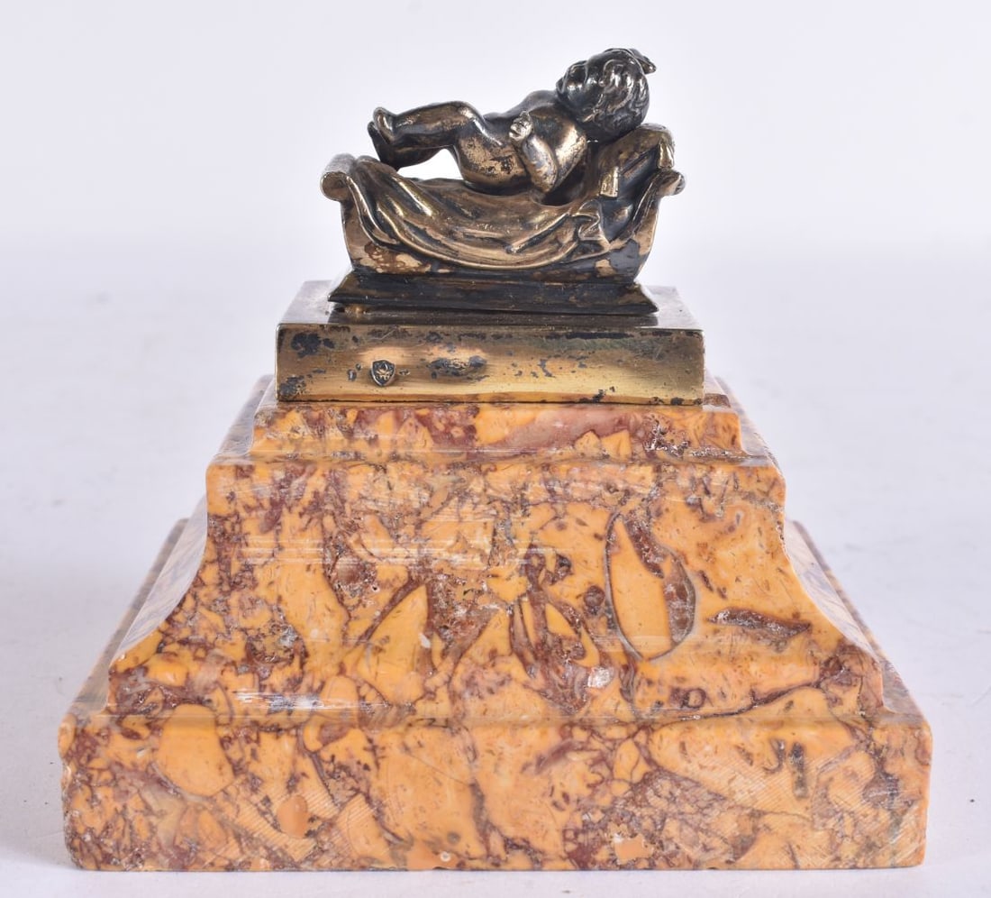 A RARE 19TH CENTURY SILVER GILT AND STEPPED MARBLE FIGURE modelled as a baby with arm raised. 10 cm: A RARE 19TH CENTURY SILVER GILT AND STEPPED MARBLE FIGURE modelled as a baby with arm raised. 10 cm x 9.5 cm.