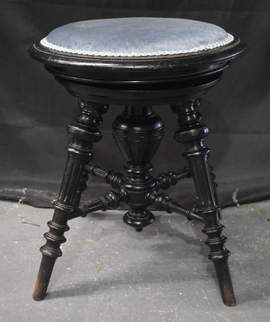 AN AESTHETIC MOVEMENT EBONISED REVOLVING STOOL. 50cm x 42cm (1 of 5)