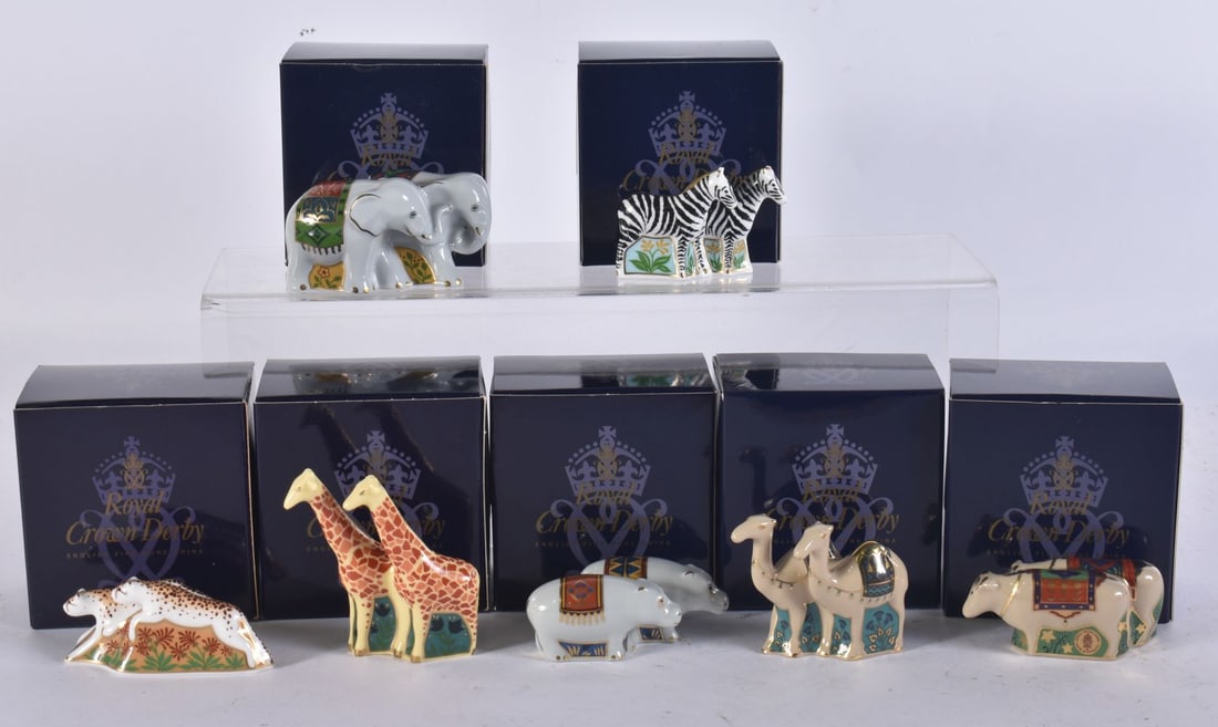 SEVEN MINIATURE ROYAL CROWN DERBY PAPERWEIGHTS. (7) (1 of 3)