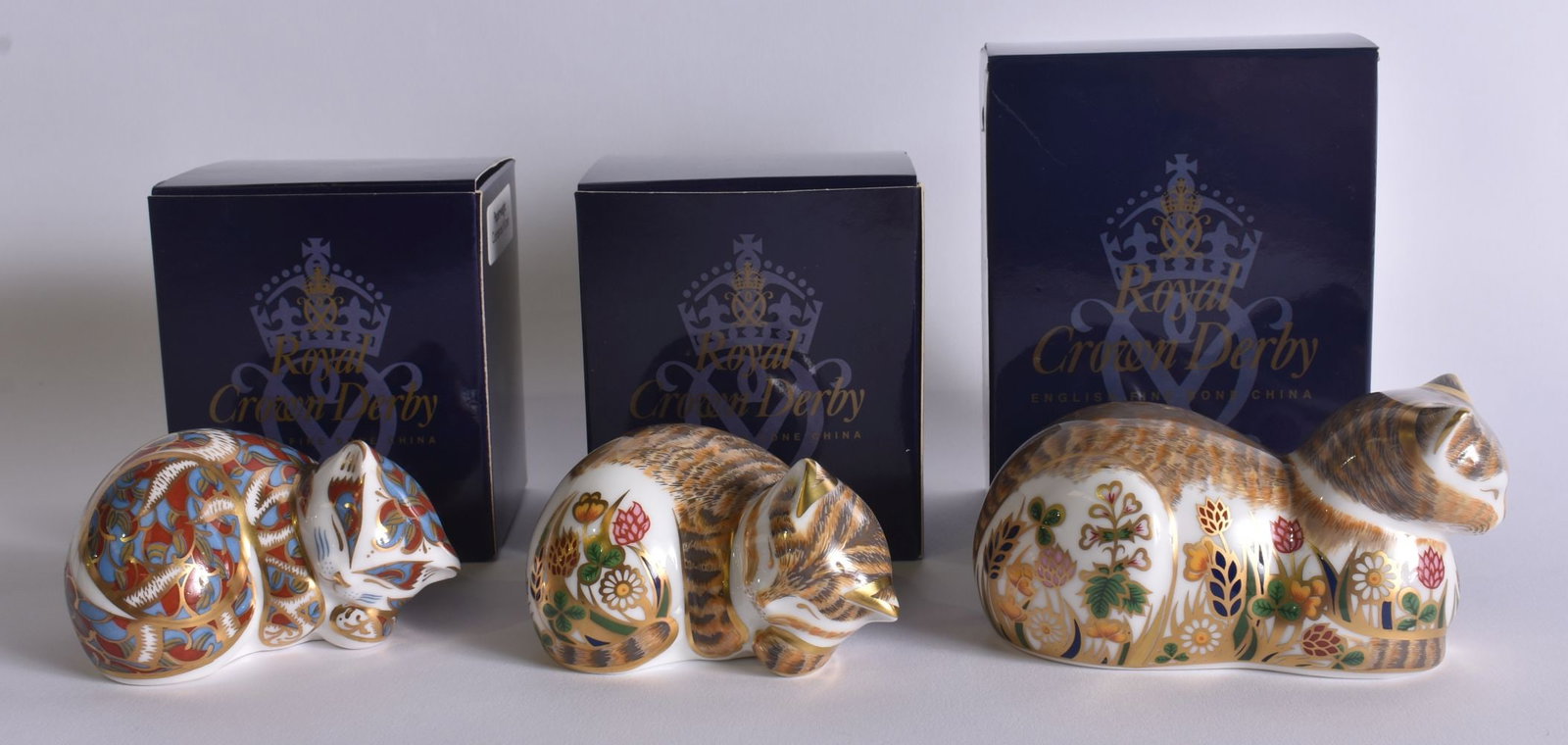 THREE ROYAL CROWN DERBY PAPERWEIGHTS Cottage cat, contented kitten & palm cottage garden kitten. (3) (1 of 4)
