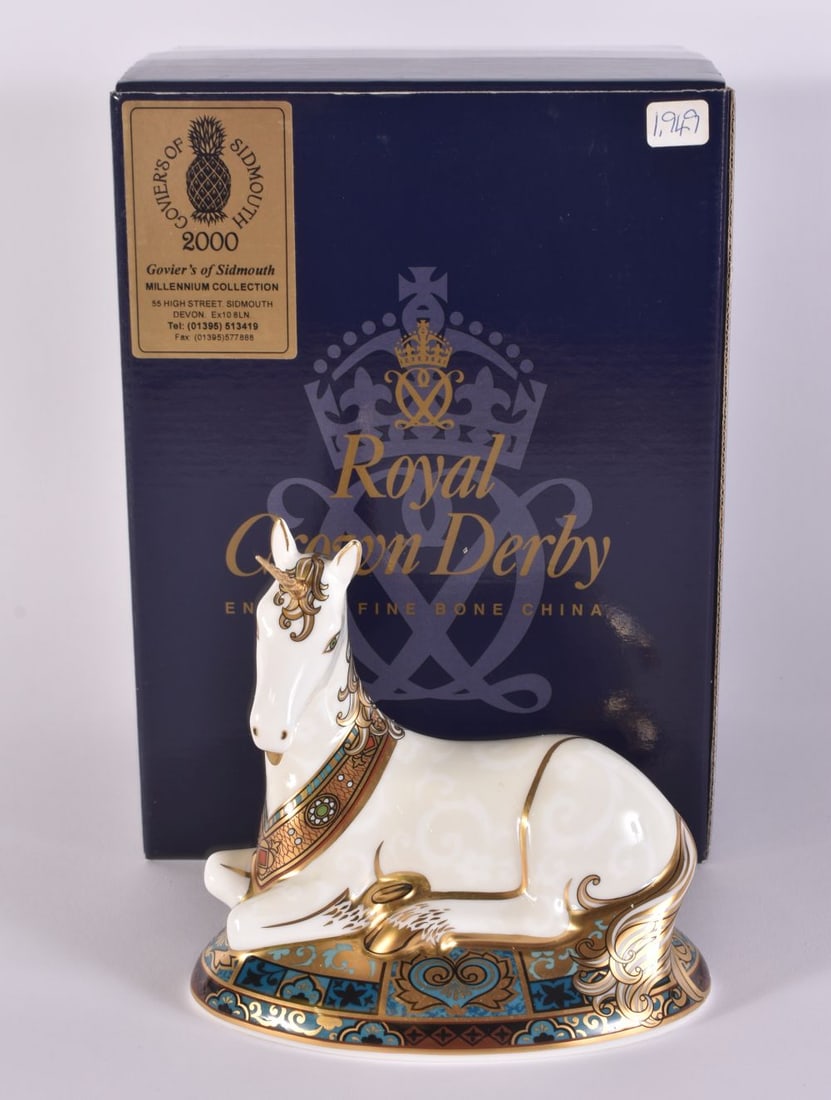 A ROYAL CROWN DERBY UNICORN GOVIERS PAPERWEIGHT. 15 cm wide.: A ROYAL CROWN DERBY UNICORN GOVIERS PAPERWEIGHT. 15 cm wide.