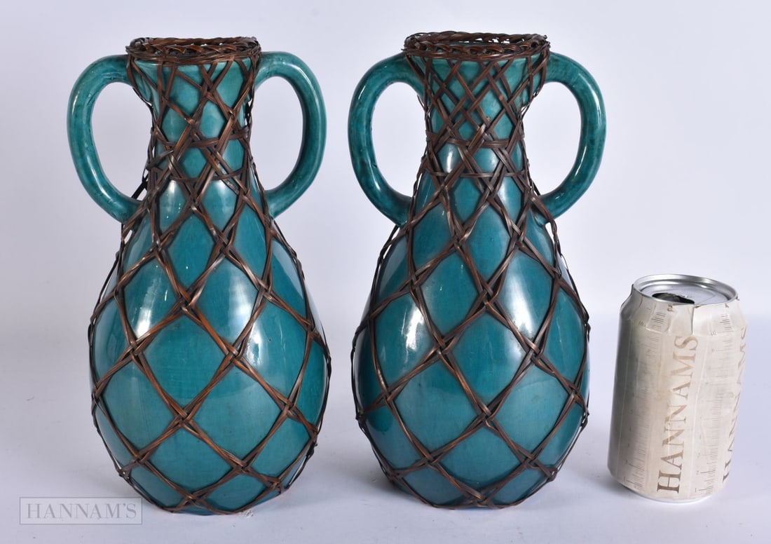 A PAIR OF EARLY 20TH CENTURY JAPANESE TURQUOISE GLAZED PORCELAIN VASES with overlaid wicker work. 24 (1 of 5)