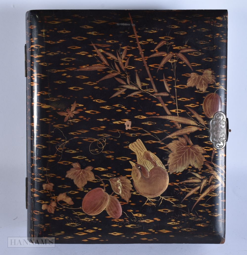 AN EARLY 20TH CENTURY JAPANESE MEIJI PERIOD BLACK LACQUER BOX formed as a book. 24 cm x 18 cm.: AN EARLY 20TH CENTURY JAPANESE MEIJI PERIOD BLACK LACQUER BOX formed as a book. 24 cm x 18 cm.