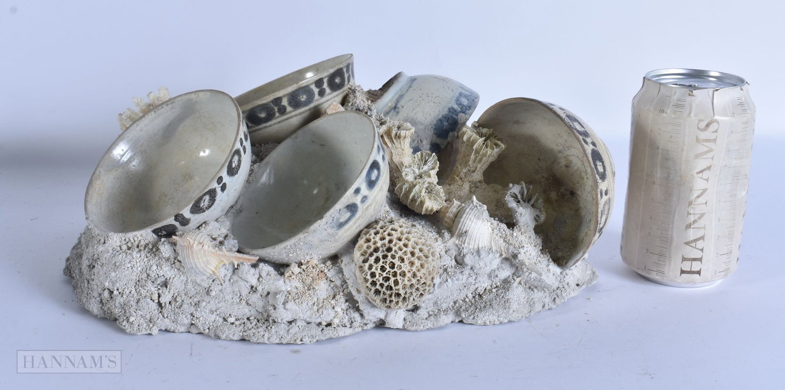 A CHINESE QING DYNASTY SHIPWRECK BLUE AND WHITE CORAL SCULPTURE. 30cm x 18 cm.: A CHINESE QING DYNASTY SHIPWRECK BLUE AND WHITE CORAL SCULPTURE. 30cm x 18 cm.