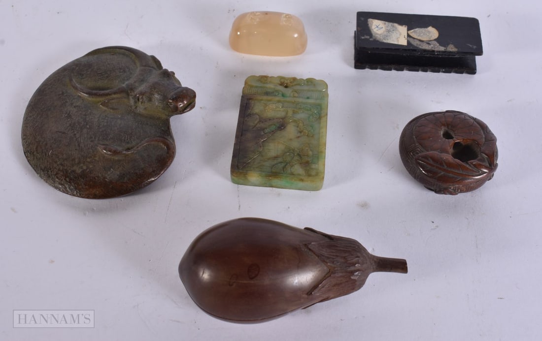 AN 18TH/19TH CENTURY JAPANESE WOOD NETSUKE together with a jade plaque etc. (qty) (1 of 2)
