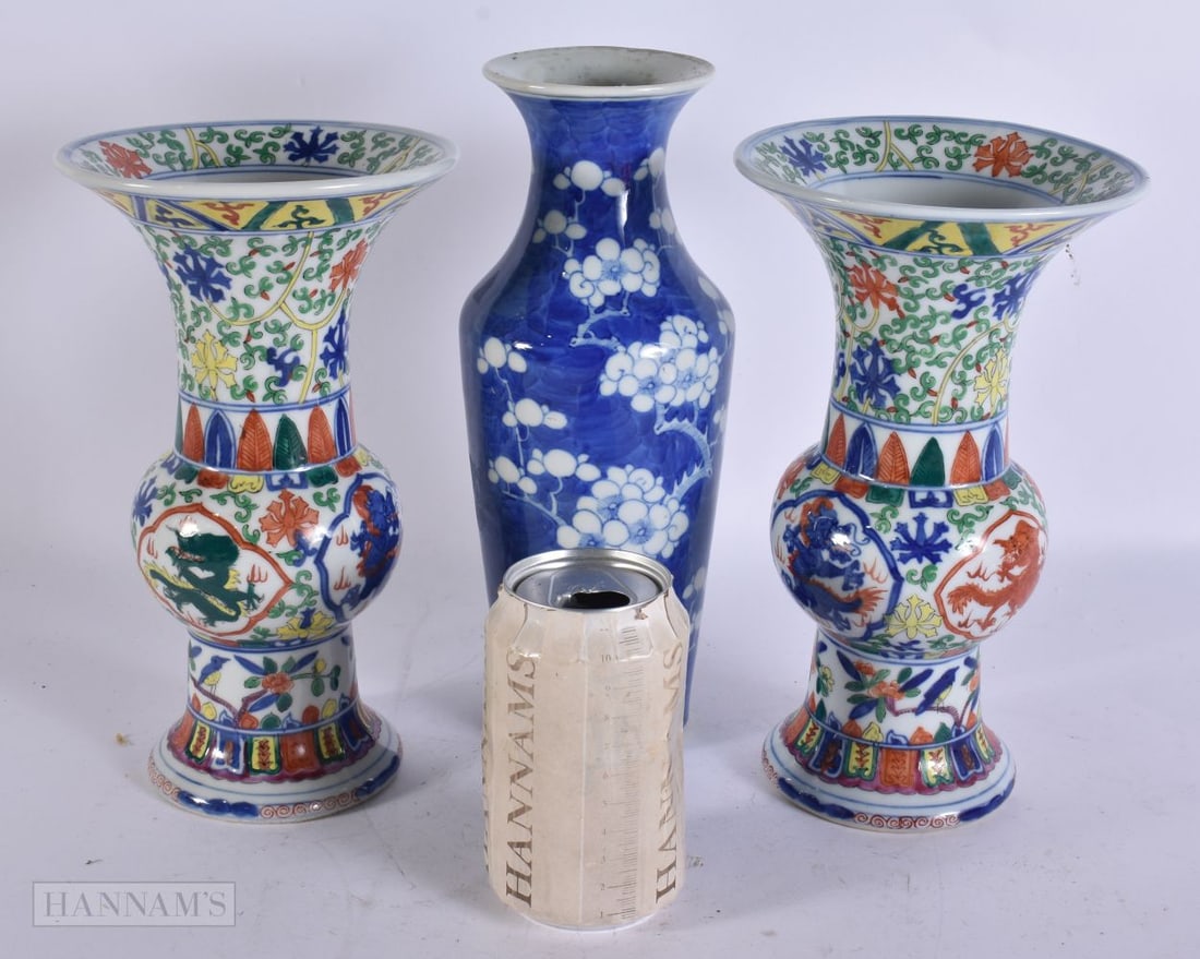 A 19TH CENTURY CHINESE BLUE AND WHITE PORCELAIN VASE Late Qing, together with a pair of vases. Large (1 of 3)