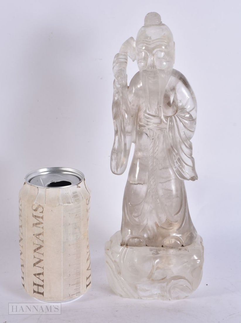 A 19TH CENTURY CHINESE CARVED ROCK CRYSTAL FIGURE Qing. 27cm high.: A 19TH CENTURY CHINESE CARVED ROCK CRYSTAL FIGURE Qing. 27cm high.