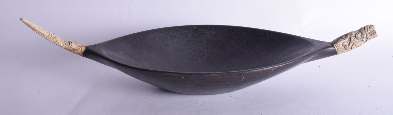 A TRIBAL CARVED WOOD SOUTHSEA ISLANDS BOWL. 48 cm wide.: A TRIBAL CARVED WOOD SOUTHSEA ISLANDS BOWL. 48 cm wide.