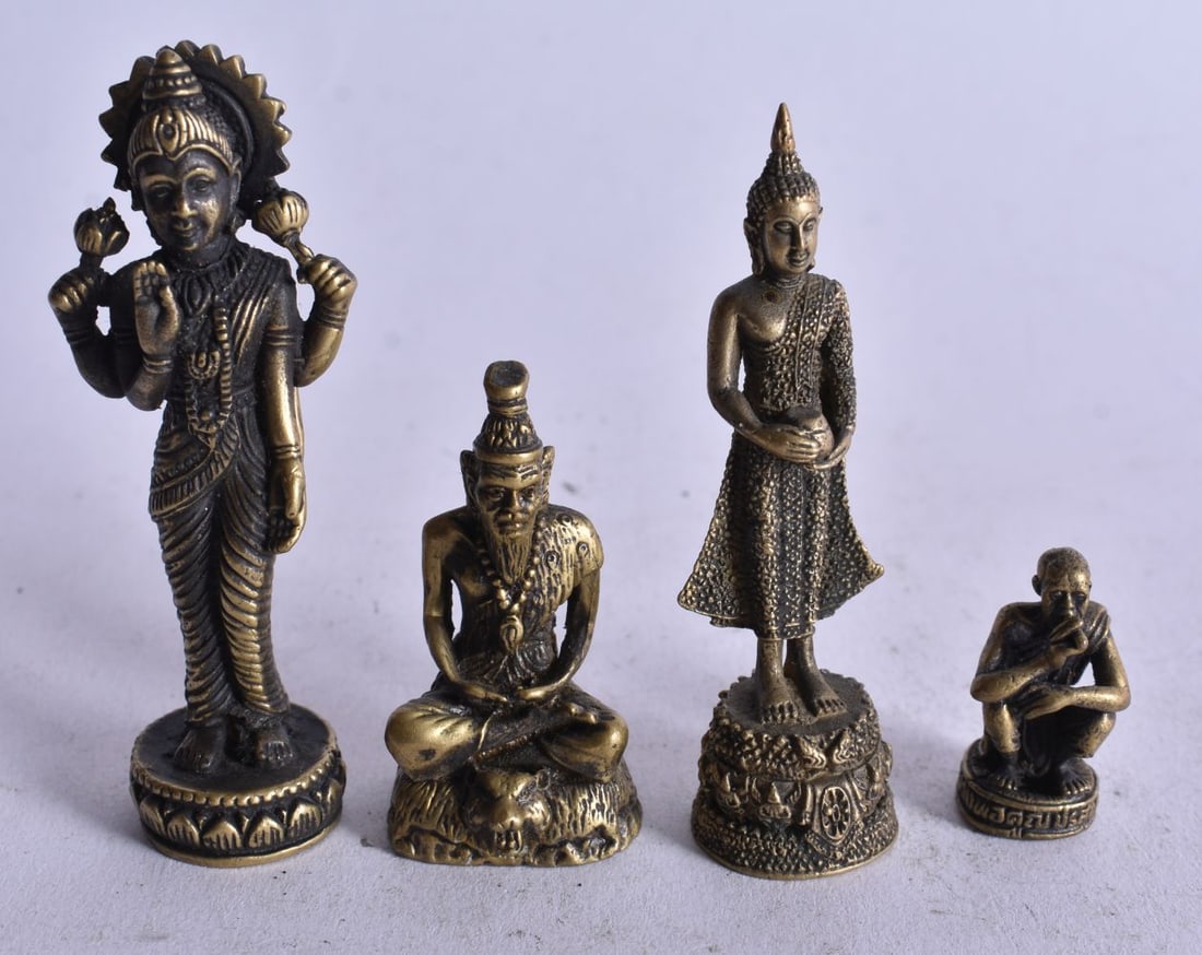 THREE BRONZE DEITIES. 6 cm high. (3) (1 of 4)