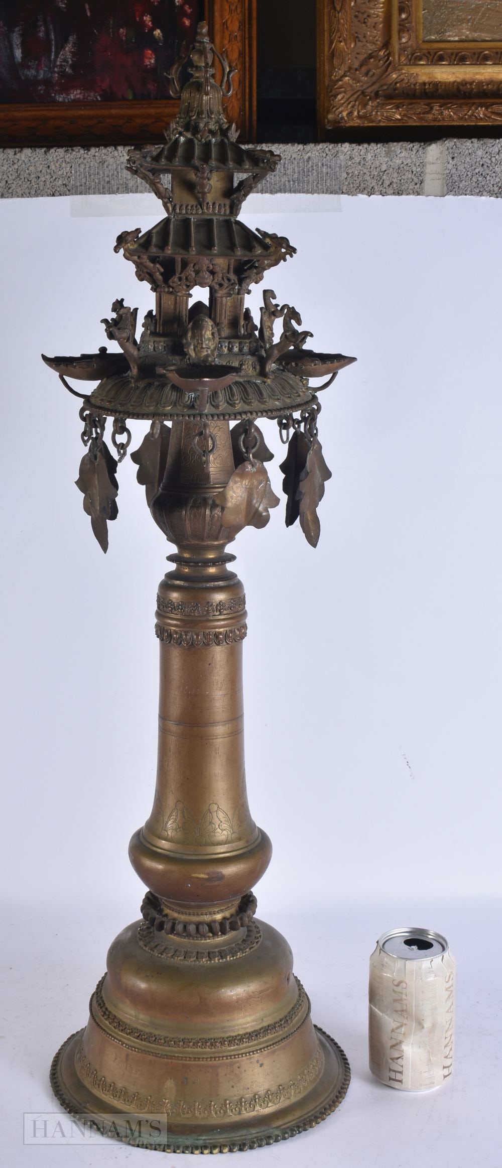 A LARGE 19TH CENTURY TIBETAN NEPALESE BRONZE TEMPLE OIL BURNER formed with figures, inscribed with s (1 of 9)
